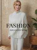A detailed showcase of the cashmere cardigan sweater, highlighting its soft fabric, cozy fit, and stylish versatility.